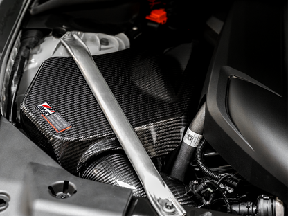 AWE Tuning 2020+ Toyota GR Supra S-FLO Carbon Intake for the MK5 Toyota Supra GR A90 MKV - Product overview installed in engine bay with cover, closeup